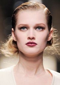This romantic look is reminiscent of the 30's. To create fullness at the crown, part your hair to the opposite side of your natural part. Keep it sleek by spraying your comb with hairspray and gently combing down flyaways.