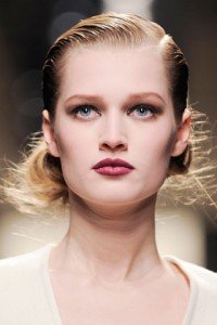 This romantic look is reminiscent of the 30's. To create fullness at the crown, part your hair to the opposite side of your natural part. Keep it sleek by spraying your comb with hairspray and gently combing down flyaways. 