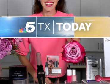Woman in pink top with beauty products