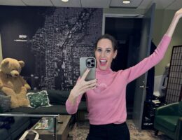 Nicole Pearl wearing pink heart sweater