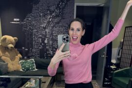 Nicole Pearl wearing pink heart sweater